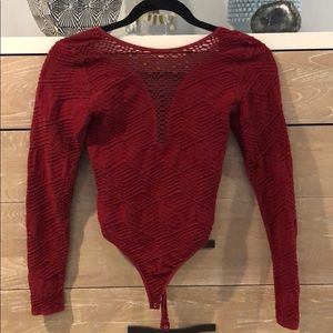 Burgundy heart shaped body suit